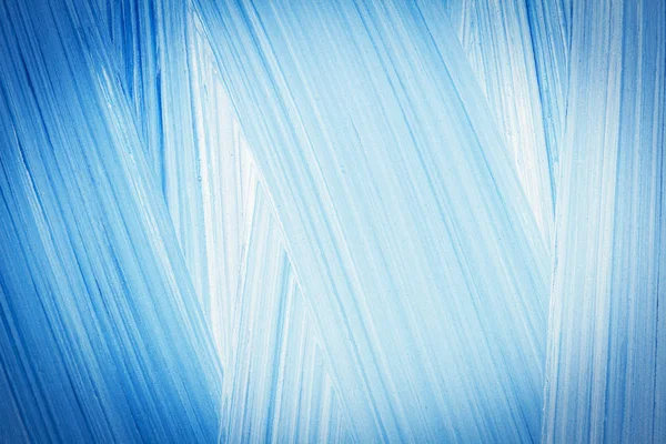 Абстрактное расчесывание синего акрилового фона — стоковое фото
