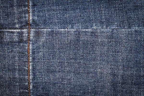 深蓝色牛仔裤质地 带接缝的斜纹织物衬底 — 图库照片