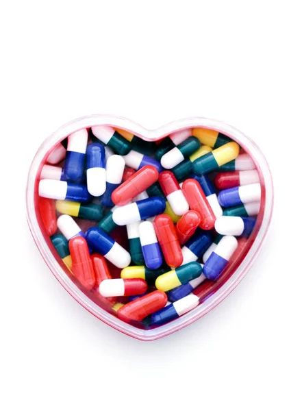 ハート型の箱で心臓薬 — ストック写真