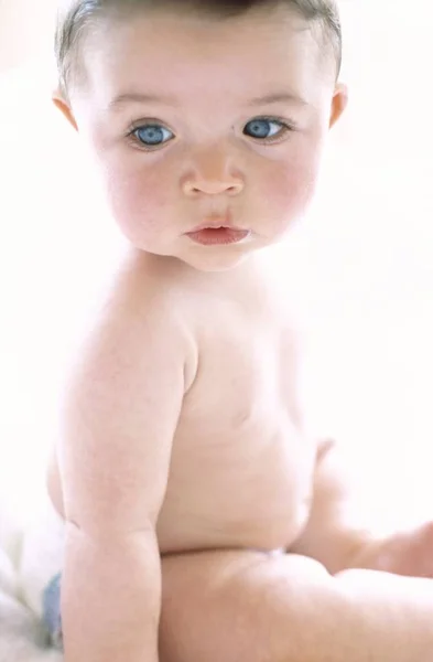 Baby Boy Sitting Looking Away — Stock Photo, Image