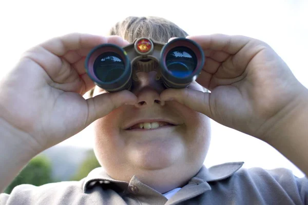 Obese Boy Using Binoculars Outdoors — Stock Photo, Image