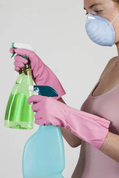 Close Woman Wearing Face Mask Holding Cleaning Materials Hands — Stock Photo, Image