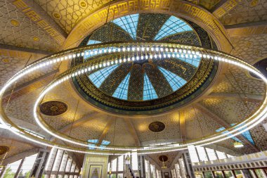 ARGUN, CHECHNYA, RUSSIA - Aug 2019: Aymani Kadyrova Mosque interior in Argun, Chechnya, Russia clipart