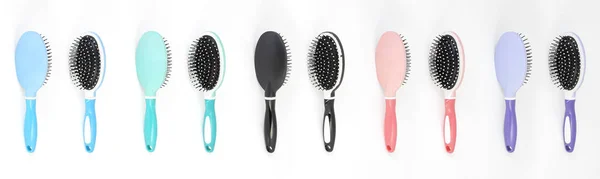 Beautiful trendy Big set of plastic hair brushes different color isolated on white background front and back view — Stock Photo, Image
