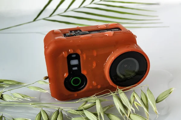 Action camera with water drops