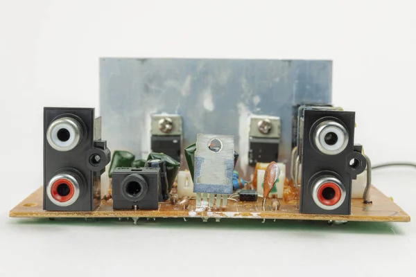 Electronic circuit board of audio amplifier close-up on a white background. — Stock Photo, Image