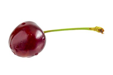 Kiraz rengi yakın plan beyaz arkaplanla yatar..