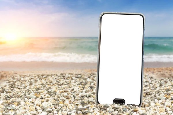 Phone with insulation on the beach and sea