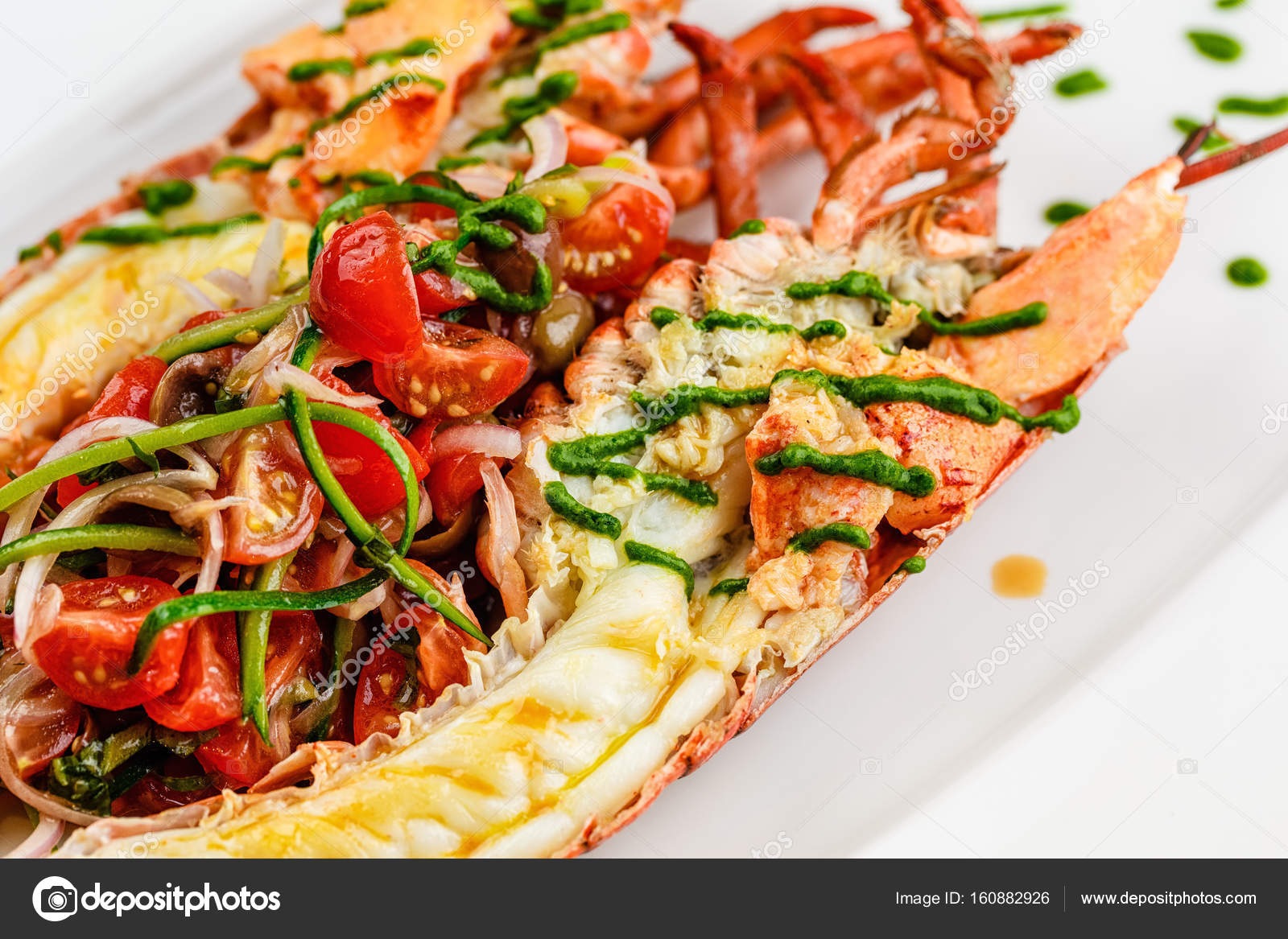 Italian cuisine. Whole lobster baked and sliced in half Served with