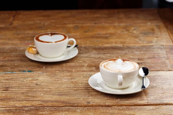 Two cups of latte coffee — Stock Photo, Image