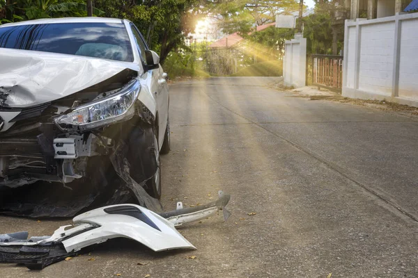 Front of white color car with pick up have big damaged and broken by accident on road in morning time can not drive any more park for wait insurance officer. With copy space for text or design — 스톡 사진