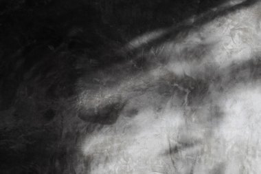 Parlak beton duvar arka plan güneş ışığıyla parlıyor..