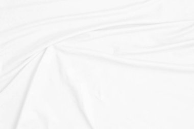 Beyaz pamuk kumaş dokusu arka planı. Dalgalı arkaplanı olan soyut beyaz kumaş. Yumuşak dalgalı beyaz kumaş. Yumuşak odaklanma tekniği. 