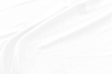 Beyaz pamuk kumaş dokusu arka planı. Dalgalı arkaplanı olan soyut beyaz kumaş. Yumuşak dalgalı beyaz kumaş. Yumuşak odaklanma tekniği. 