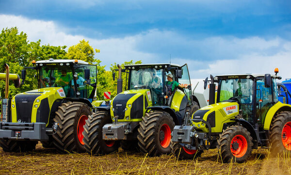 VINNITSA, UKRAINE - JULY 2017: Tractors and combines CLAAS. Agri