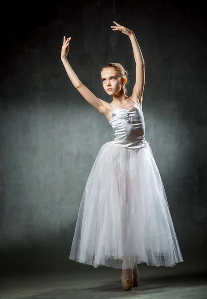 Young and incredibly beautiful ballerina posing and dancing in the studio. — Stock Photo, Image