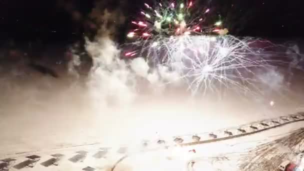 お祭り花火大会 不思議な冬の夜 航空写真ビュー — ストック動画