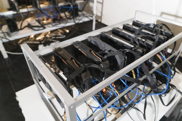 Virtual cryptocurrency concept. Farm for mining cryptocurrency on video cards. Crypto farm.