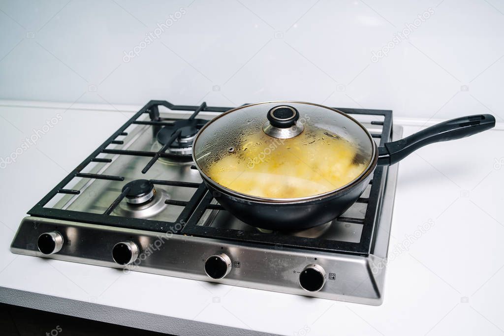 Cooking fried potatoes. Frying potatoes on the frying pan