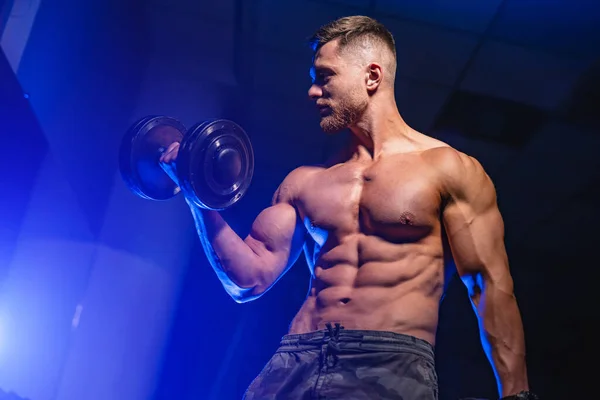 Handsome Man Big Muscles Posing Camera Gym Black Blue Background — Stockfoto