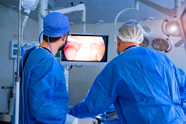 Group Surgeons Men Working Modern Equipment Back View Team Specialists — Stock Photo, Image