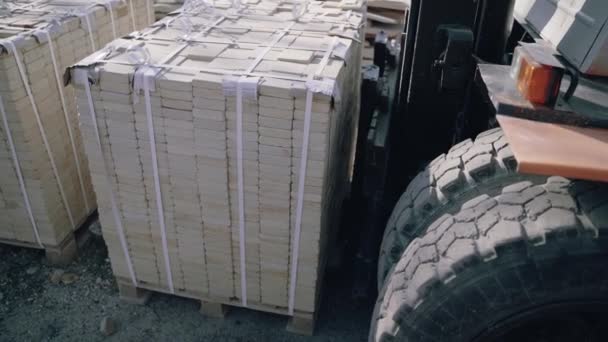 Forklift Raising One Pallet Brick Takes Away Yard Factory — Stock Video