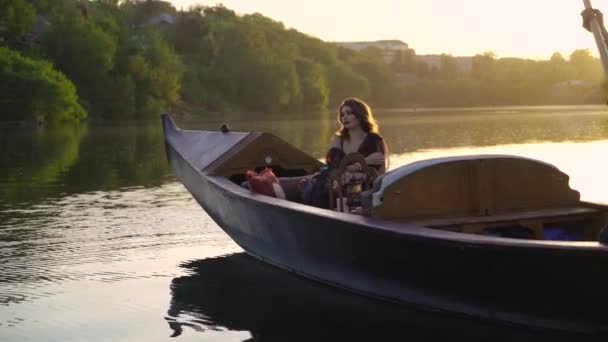 Beautiful Woman Long Hair Sitting Gondola Elegant Dress Sunset Carnival — Stock Video