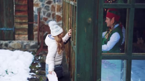 Little Girl Letter Her Hands Standing Street Looking Out Window — Stock Video