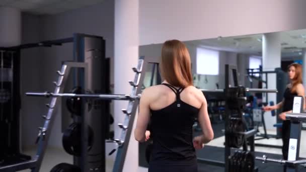 Athletic Woman Sportswear Comes Barbells Puts Weights Both Sides Healthy — Stock Video