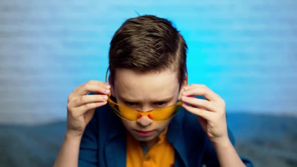 Teen Boy Putting Medical Yellow Glasses Protection Virus Disease Self — Stock Video