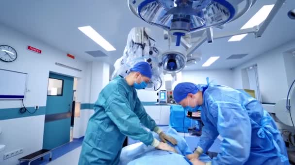 Surgery Operating Room Equipment Medical Team Performing Surgery Operation Room — Stock Video