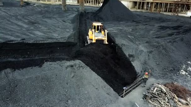 Moving tractor coal around plant for processing. Coal Production. Aerial view. — Stock Footage Moving Tractor Coal Plant Processing Coal Production Aerial View Stock Footage