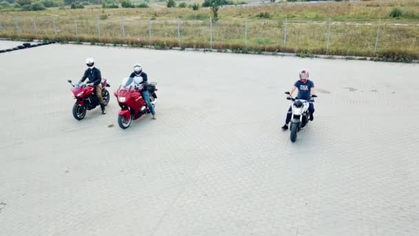 Three Motocyclists Men Riding Vehicles High Speed Outdoors Professional Motobikers — Stock Video