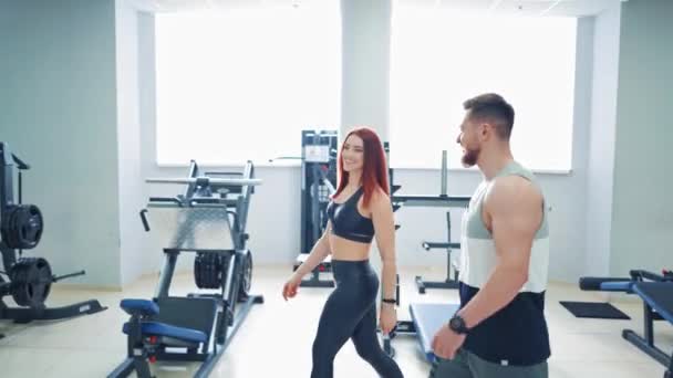 Young Attractive Woman Talking Strong Male Trainer Gym Happy Athletic — Stock Video