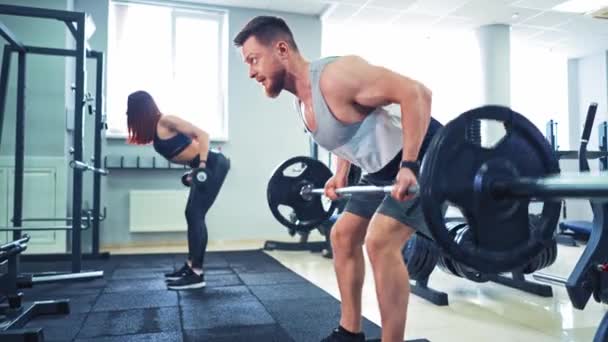 Bearded Athlete Healthy Woman Lifting Heavy Barbells Sport Center Concentrated — Stock Video