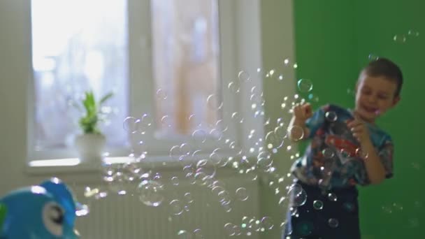 Joyful Boy Plays Soap Bubbles His Room Little Child Popping — Stock Video