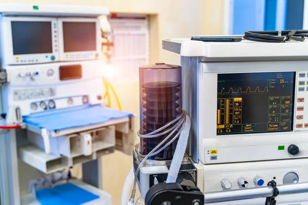 Mechanical ventilation equipment. Screen with results. Pneumonia diagnosting. Ventilation of the lungs with oxygen. COVID-19 and coronavirus identification. Pandemic.