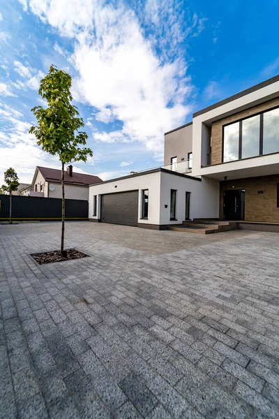 Modern villa surrounded by fence. Nobody inside. Modern arhitecture.