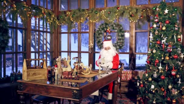 Santa Two Elves Getting Ready Christmas Specially Decorated Room Girl — Stock Video