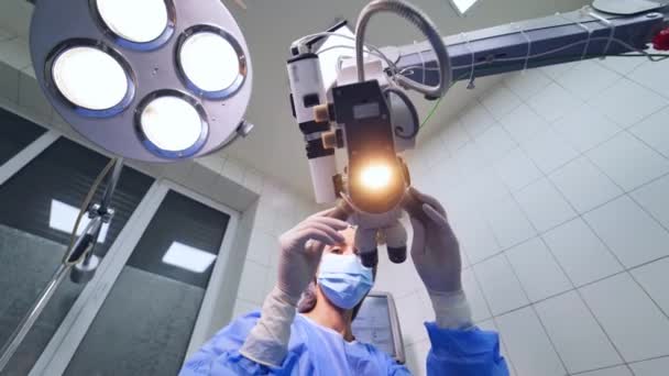 Modern Microscope Eye Operation Hospital Health Care Concept Doctor Preparing — Stock Video