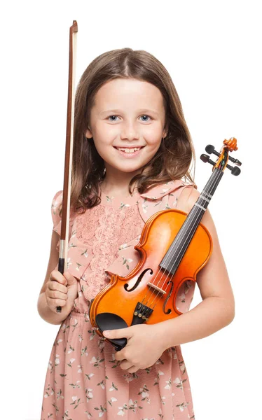 Mladá brunetka hraje housle. — Stock fotografie