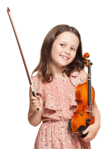 Mladá brunetka hraje housle. — Stock fotografie