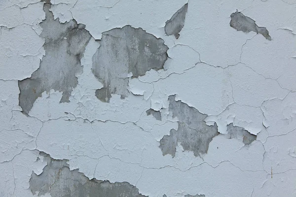 灰色混凝土墙壁上的白色油漆剥落 — 图库照片