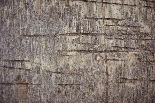 A madeira compensada velha com traços de corte — Fotografia de Stock