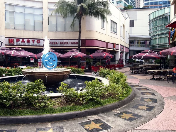 Rows of cafes and restaurants as well as site attractions at the Eastwood City — Stock Photo, Image