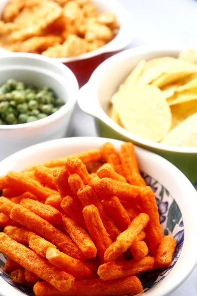 Assorted chips and junk food — Stock Photo, Image