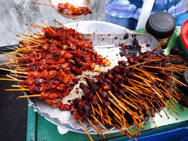 Fried pork innards on a stick — Stock Photo, Image