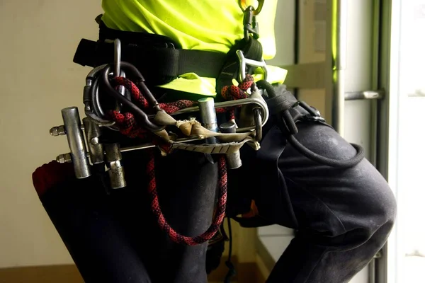 Climbing gear around the waist of a man — Stock Photo, Image