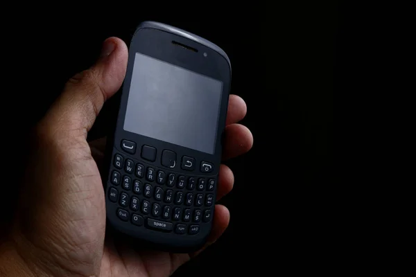 Stary i używany telefon komórkowy z klawiaturą qwerty — Zdjęcie stockowe