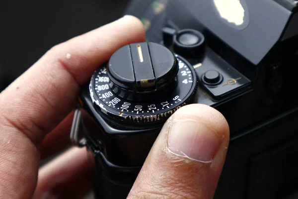 Rewind lever, exposure compensation and ISO adjustment dial of an old film camera — Stock Photo, Image